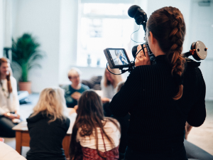 woman filming business case studies